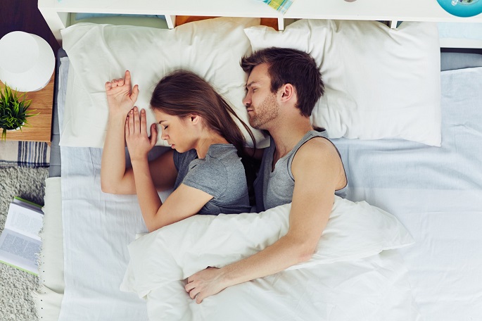 couple sleeping together
