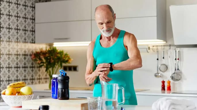 man taking pre-workout supplements