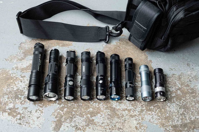 row of tactical flashlights